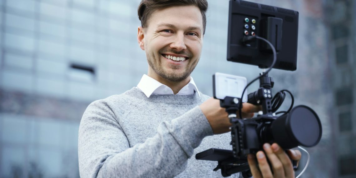 Professional videographer with a modern camera rig