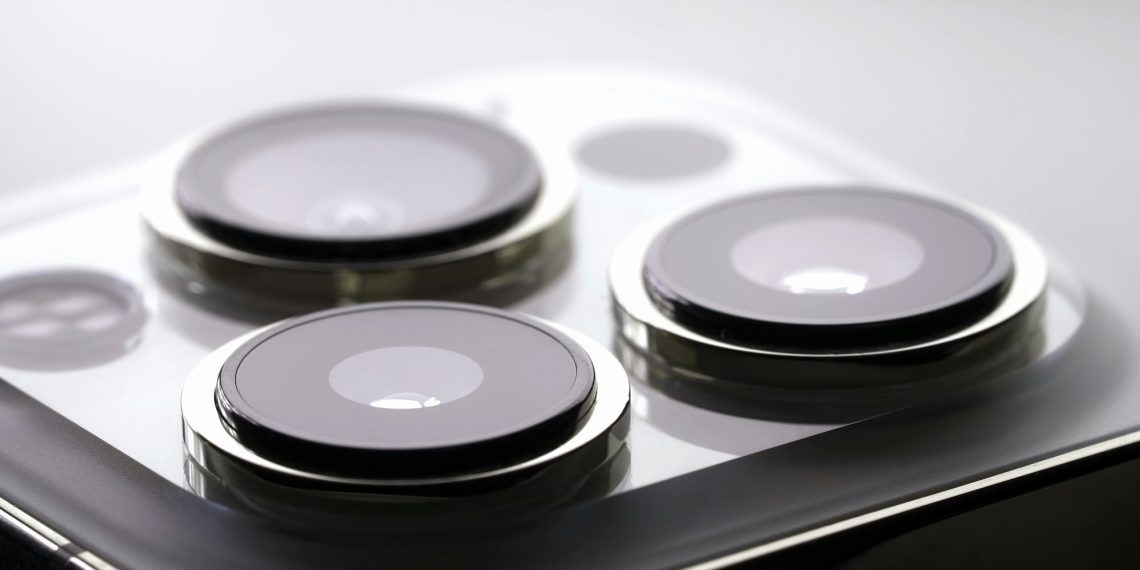 Brand Asset - Tài sản thương hiệu là gì? 1 Macro advertising, exterior design. Apple new smartphone with triple-lens camera - Ultra Wide, Wide